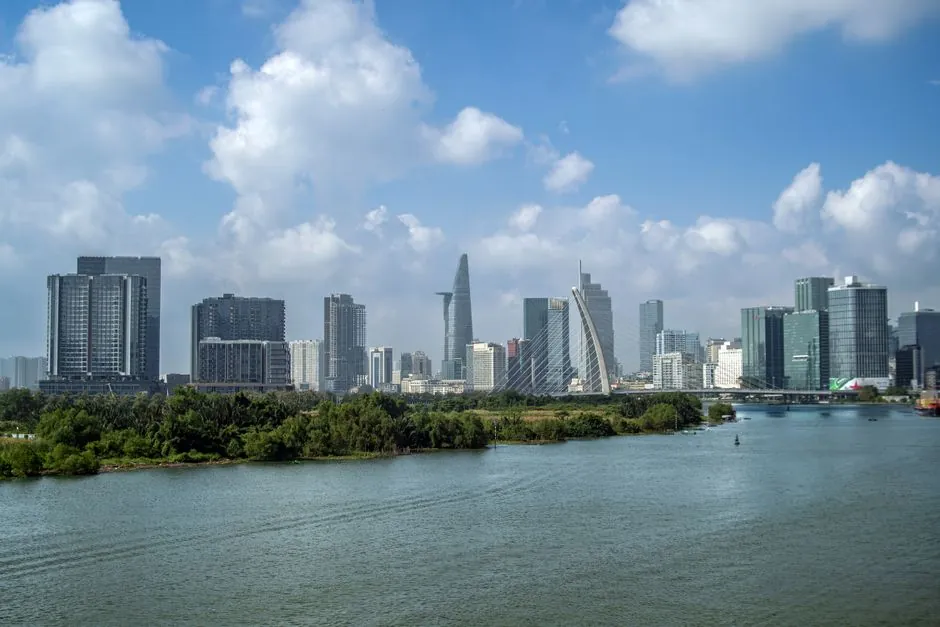 A view of the Ho Chi Minh City skyline featuring the iconic Bitexco Financial Tower.